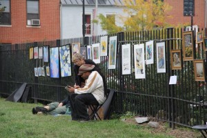 Artists display their creativity on the fence